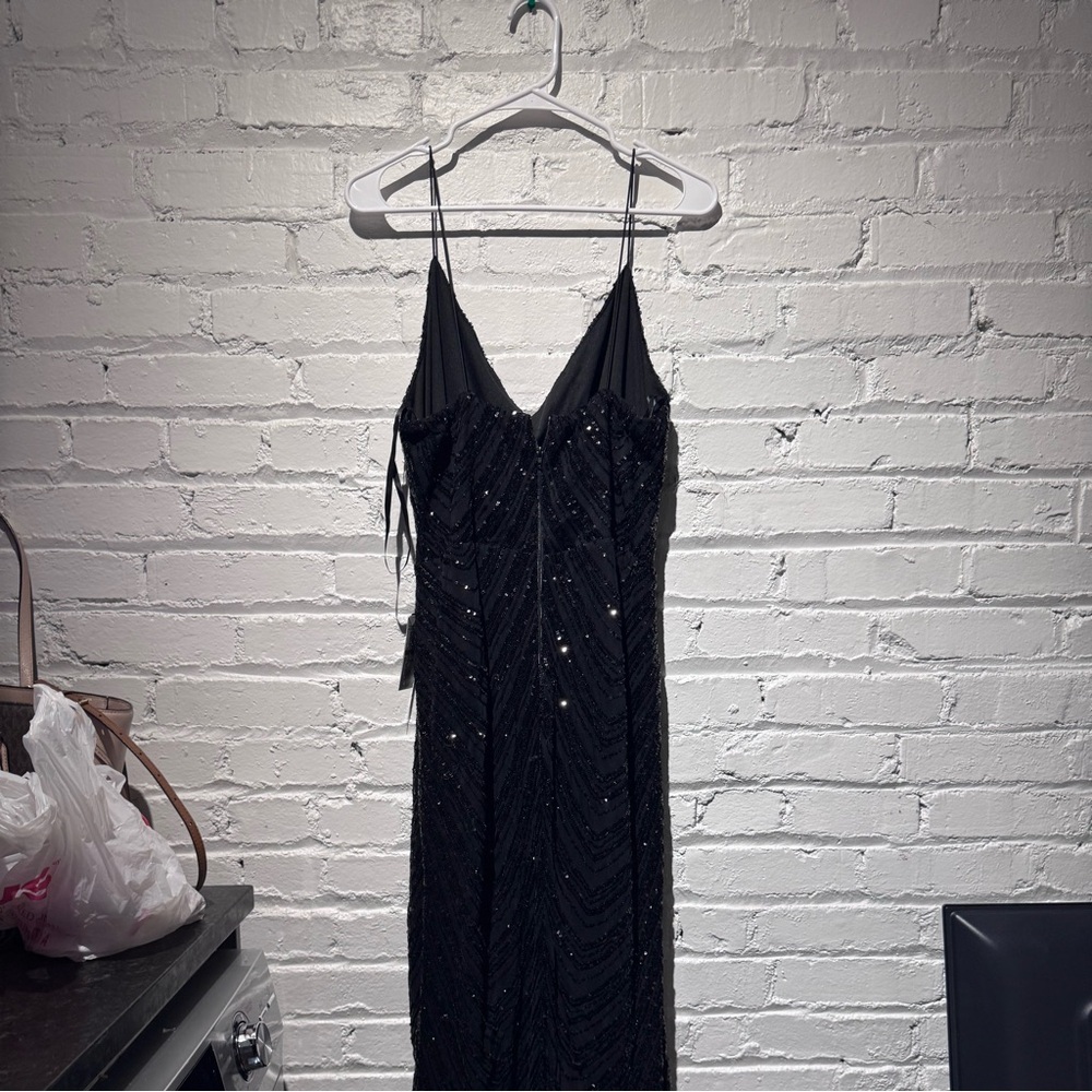 Long slit black sparkly dress